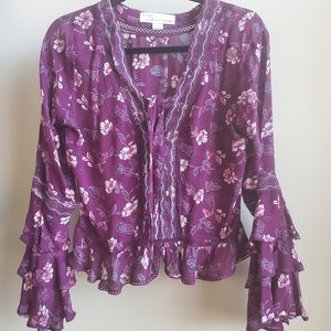 Ruffled Western bell-sleeved top.